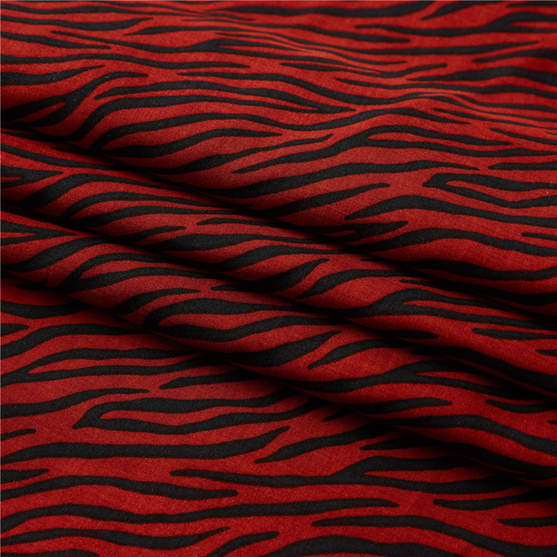 Tessuto zebrato rosso 100% popeline di rayon leggero con stampa animalier